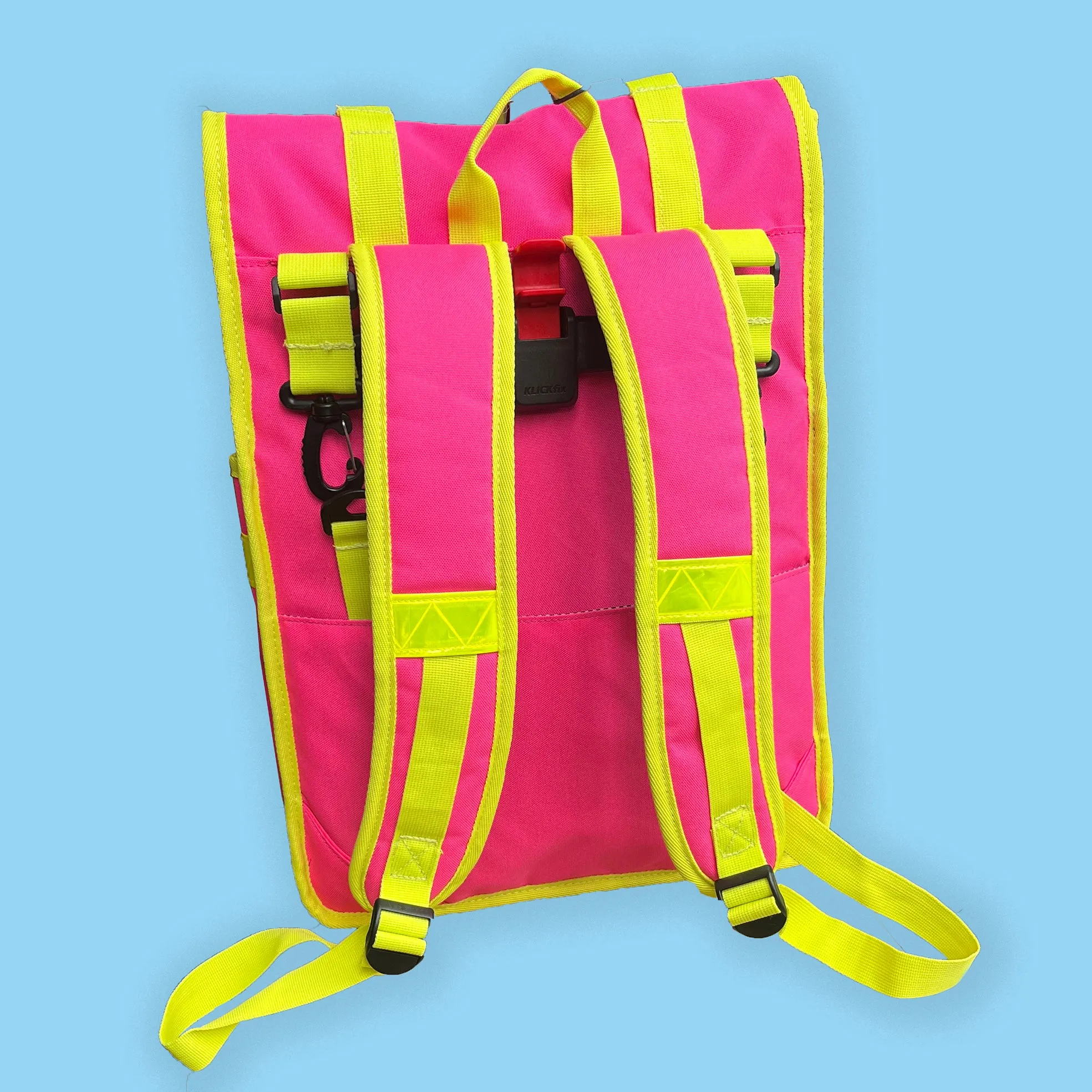 Neon pink rolltop backpack pannier bike bag Rixen kaul hardware hooks